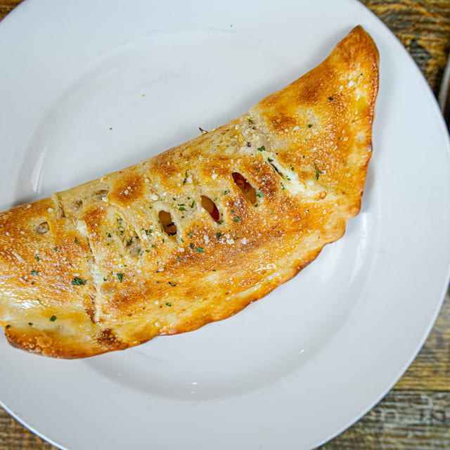 Four Cheese Calzone.